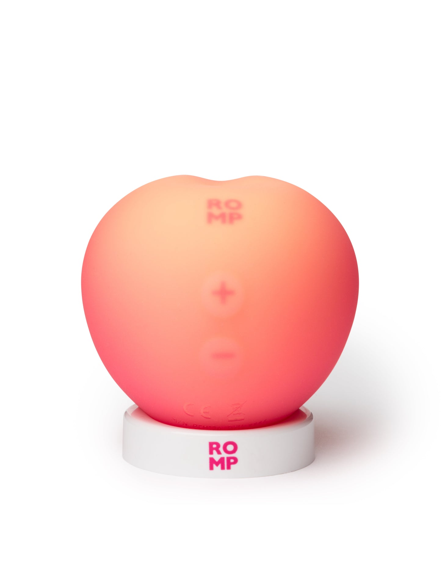 ROMP Pink Peach vibrator shown, featuring smooth silicone surface and ergonomic design for versatile pleasure.