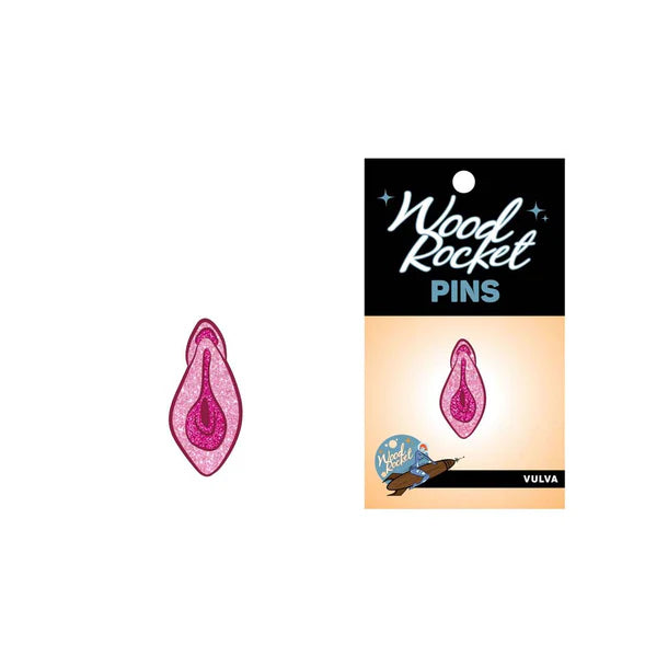 Sparkly pink enamel pin featuring a vulva design from Anastasia's Bedroom Lingerie, with detailed glitter accents and vibrant colors.