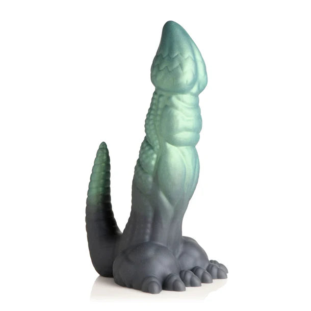Dickosaur Dinosaur Silicone Dildo from Anastasia's Bedroom Lingerie, shown in pink with detailed dinosaur texture and smooth silicone finish.