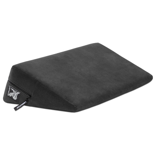 Black velvet wedge decor furniture by Liberator, featuring a sleek, modern design with plush velvet upholstery and sturdy structure.