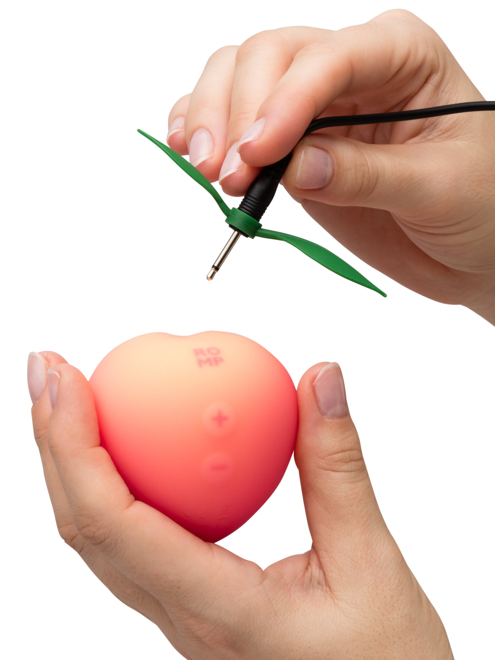 ROMP Pink Peach vibrator shown with smooth, curved design in soft pink color, designed for intimate pleasure.