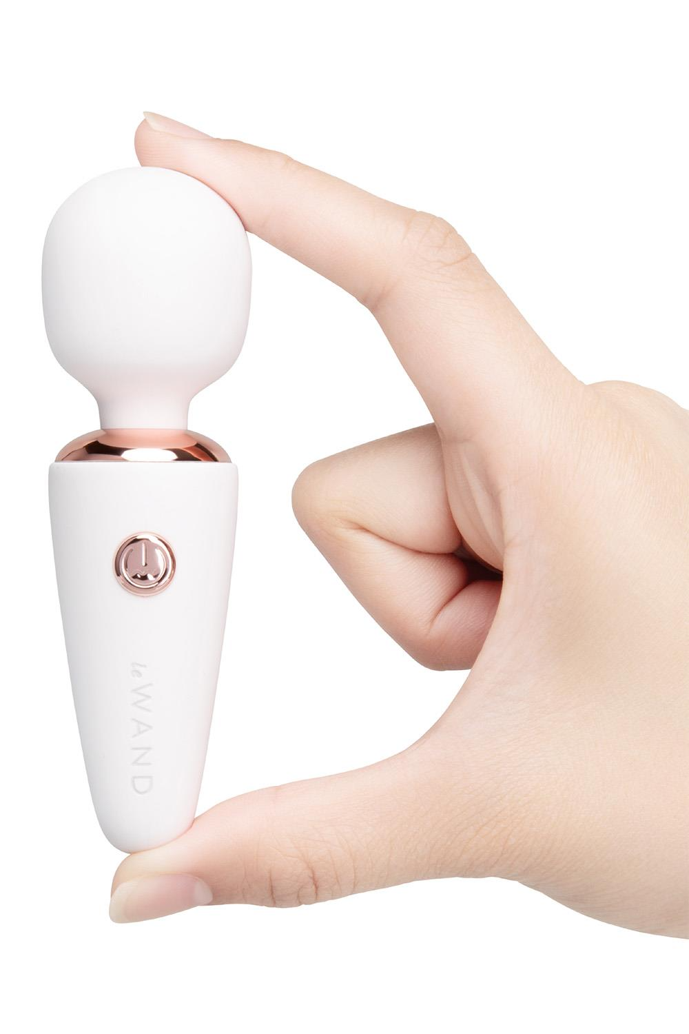 White LE Wand Mini Micro Wand vibrator with smooth surface and compact design for discreet personal pleasure.