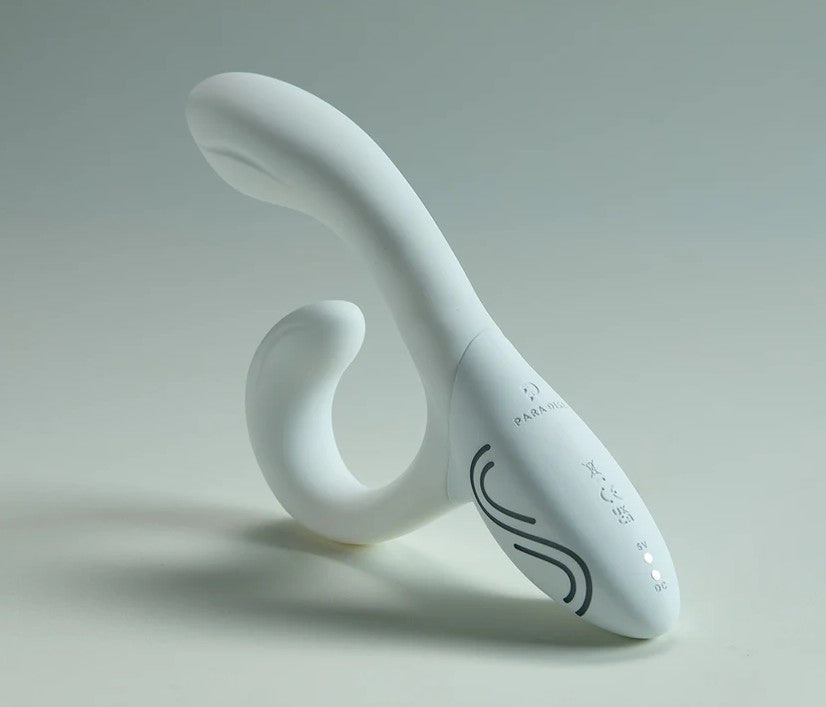 Illumination The Rabbit vibrator by Paradise, showing the sleek, dual-motor design with textured surface and flexible shaft.
