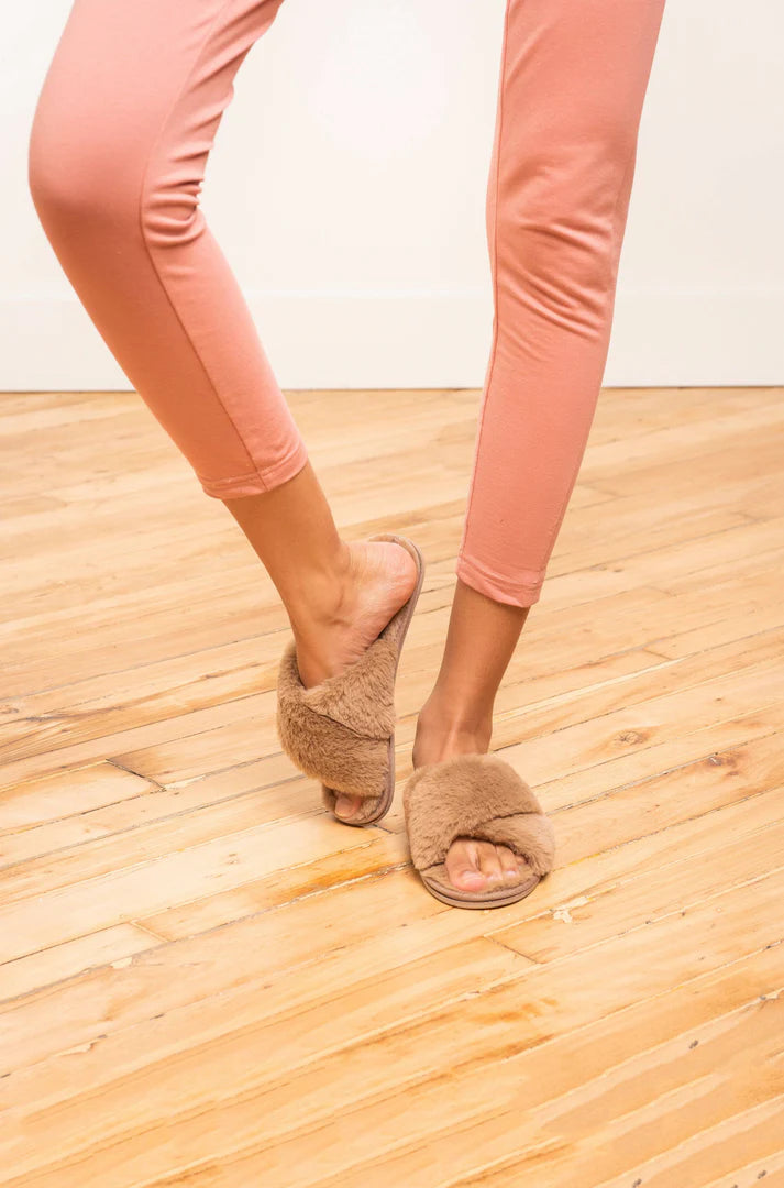 Soft faux fur slippers from Anastasia's Bedroom Lingerie featuring plush lining and slip-on design for cozy comfort.